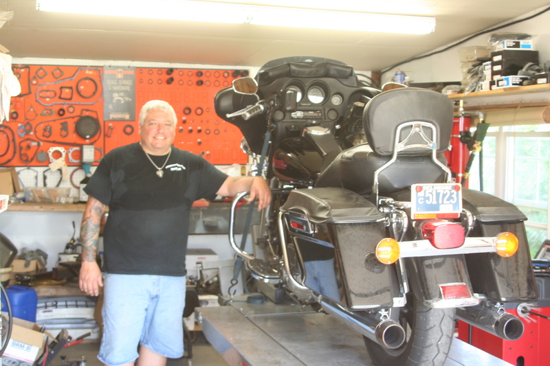 Evolution Cycles & Sports co-owner Rich Savage stocks the shop on Route 1 with items to keep local and visiting Harley-Davidson riders rolling down the road. Evolution offers motorcycle breakdown pick-up and delivery services. “Sometimes it might take us a while to get to you, but we will get to you,” Savage said. BY HENRY J. EVANS JR.